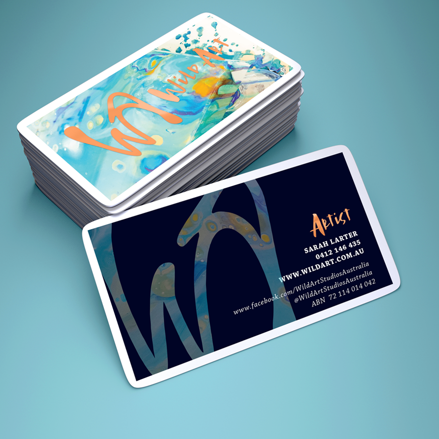 Mockup of business cards designed for WildArt featuring acrylic artwork and gold foil printing